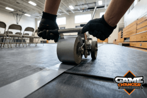gym floor cover setup before a big school event